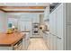 An expansive kitchen with stainless steel appliances, wood counters, and custom cabinetry at 1016 Old Powers Ferry Rd, Atlanta, GA 30327