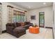 Comfortable living room with a plush sectional sofa, soft rug, and windows with natural light at 1016 Old Powers Ferry Rd, Atlanta, GA 30327