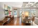 An open concept living room with hardwood floors, high ceilings, and lots of natural light at 1016 Old Powers Ferry Rd, Atlanta, GA 30327