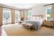 Spacious main bedroom with neutral tones, a sitting area, and direct access to the yard at 1016 Old Powers Ferry Rd, Atlanta, GA 30327