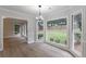 Dining room features a bay window overlooking the backyard and new hardwood floors at 3807 Lance Bluff Ct, Duluth, GA 30097