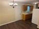 Cozy kitchen and dining area with classic wood cabinets and essential appliances at 796 Cohran Store Rd, Douglasville, GA 30134