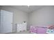 Bedroom featuring a dresser, bed, window, and closet at 8040 Banks Mill Rd, Douglasville, GA 30135
