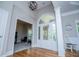 Welcoming foyer with hardwood floors and open view to the study at 8040 Banks Mill Rd, Douglasville, GA 30135
