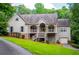 Beautiful home with a well-manicured lawn and a welcoming front porch at 8040 Banks Mill Rd, Douglasville, GA 30135