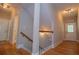 Bright hallway featuring hardwood floors, white trim and neutral paint colors, with easy access to rooms at 8040 Banks Mill Rd, Douglasville, GA 30135