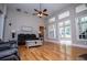 Bright living room features hardwood floors, high ceilings, and abundant natural light at 8040 Banks Mill Rd, Douglasville, GA 30135