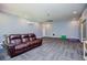 Spacious room with a ceiling fan, carpeting, recessed lighting, and modern paint colors at 8040 Banks Mill Rd, Douglasville, GA 30135