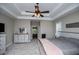 Spacious main bedroom featuring a tray ceiling and large dresser at 8040 Banks Mill Rd, Douglasville, GA 30135