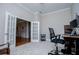 Comfortable home office area with carpet, and open access to other rooms at 8040 Banks Mill Rd, Douglasville, GA 30135