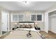 Nicely decorated bedroom featuring natural light, fresh paint and a closet at 847 Magna Carta Nw Dr, Atlanta, GA 30318