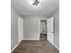 Bedroom featuring wood floors, fresh paint, ample closet space and natural light at 847 Magna Carta Nw Dr, Atlanta, GA 30318