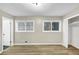 Bright bedroom features double windows, a closet and fresh paint at 847 Magna Carta Nw Dr, Atlanta, GA 30318