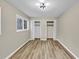 Bedroom with double closets, modern lighting, fresh paint and natural light at 847 Magna Carta Nw Dr, Atlanta, GA 30318