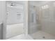 Bathroom with glass enclosed shower and view of bedroom at 102 Brackley Dr, Cumming, GA 30040