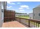 Wood deck overlooking the well-maintained lawn and greenery of this neighborhood at 102 Brackley Dr, Cumming, GA 30040