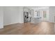 Open-concept living space with a bright kitchen with island at 102 Brackley Dr, Cumming, GA 30040