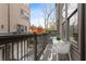 Exterior balcony featuring an outdoor table and chairs, overlooking a green space at 332 Gibson Se St, Atlanta, GA 30316