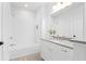 Bright, neutral bathroom featuring white subway tile and a modern vanity with gray countertop at 332 Gibson Se St, Atlanta, GA 30316