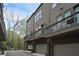 Three-story home exteriors featuring balconies and drive-in garages at 332 Gibson Se St, Atlanta, GA 30316