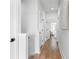 Hallway featuring hardwood floors, modern lighting, and access to other rooms at 332 Gibson Se St, Atlanta, GA 30316