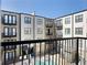 View from balcony showcasing the community pool and architecture at 5300 Peachtree Rd # 2309, Chamblee, GA 30341