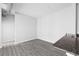 Open-concept living space features granite countertops and gray wood flooring at 5300 Peachtree Rd # 2309, Chamblee, GA 30341