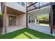 Backyard patio with grass and shade from trees at 812 Autry Oak Ct, Alpharetta, GA 30022