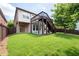 The backyard features a staircase leading to a second story deck at 812 Autry Oak Ct, Alpharetta, GA 30022