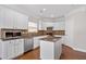 Modern kitchen with white cabinetry, stainless steel appliances, and granite counters at 812 Autry Oak Ct, Alpharetta, GA 30022