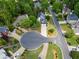 An aerial view of a neighborhood showing the layout of homes, streets, and cul-de-sacs at 1552 Brentwood Dr, Marietta, GA 30062