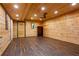 Finished basement with wood paneled walls at 1552 Brentwood Dr, Marietta, GA 30062