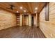 Finished basement with wood paneled walls at 1552 Brentwood Dr, Marietta, GA 30062