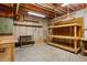 Unfinished basement with shelving at 1552 Brentwood Dr, Marietta, GA 30062