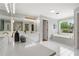 Bright bathroom featuring double vanity, soaking tub, and elegant fixtures with views to the outdoors at 1552 Brentwood Dr, Marietta, GA 30062