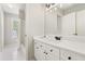 Bright bathroom features quartz countertops, and updated fixtures at 1552 Brentwood Dr, Marietta, GA 30062