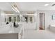 Bright bathroom with dual sinks, marble countertops, and modern lighting at 1552 Brentwood Dr, Marietta, GA 30062