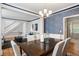 Stylish dining area with elegant lighting and easy access to the living room at 1552 Brentwood Dr, Marietta, GA 30062