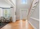 Spacious foyer with hardwood floors, staircase, and elegant architectural details at 1552 Brentwood Dr, Marietta, GA 30062