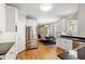 Open-concept kitchen and dining area with stainless steel appliances at 1552 Brentwood Dr, Marietta, GA 30062