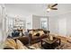 Open living area features a sofa and hardwood floors with a view to the dining area and kitchen at 1552 Brentwood Dr, Marietta, GA 30062