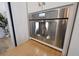 Sleek built-in stainless steel appliance with custom white cabinetry at 1895 Henley Way, Alpharetta, GA 30009
