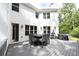 Back deck with outdoor seating and a built in grill station that is perfect for entertaining at 1895 Henley Way, Alpharetta, GA 30009