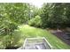 Expansive backyard with lush lawn and perimeter landscaping at 1895 Henley Way, Alpharetta, GA 30009