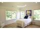 Bright bedroom with large windows and natural light at 1895 Henley Way, Alpharetta, GA 30009