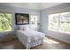 Inviting bedroom with natural light and hardwood floors at 1895 Henley Way, Alpharetta, GA 30009