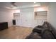 Home theater room featuring leather recliners, built-in bar and refreshments center, and a recessed ceiling at 1895 Henley Way, Alpharetta, GA 30009