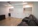 Another view of the home movie room with built-in cabinets and shelving, ideal for storage and display at 1895 Henley Way, Alpharetta, GA 30009