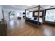 Spacious main bedroom suite featuring a sitting area, hardwood floors, and natural light at 1895 Henley Way, Alpharetta, GA 30009