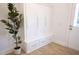 Mudroom with custom white cabinets and drawers, offering ample storage space at 1895 Henley Way, Alpharetta, GA 30009